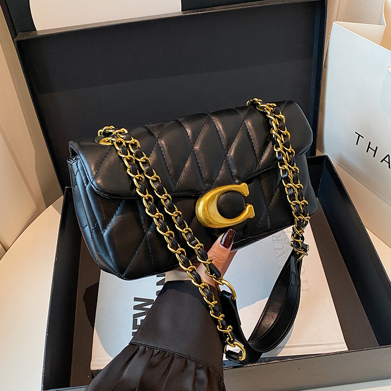 Interior Design Gold - Dames gewatteerde leren schoudertas Luxe C-logo