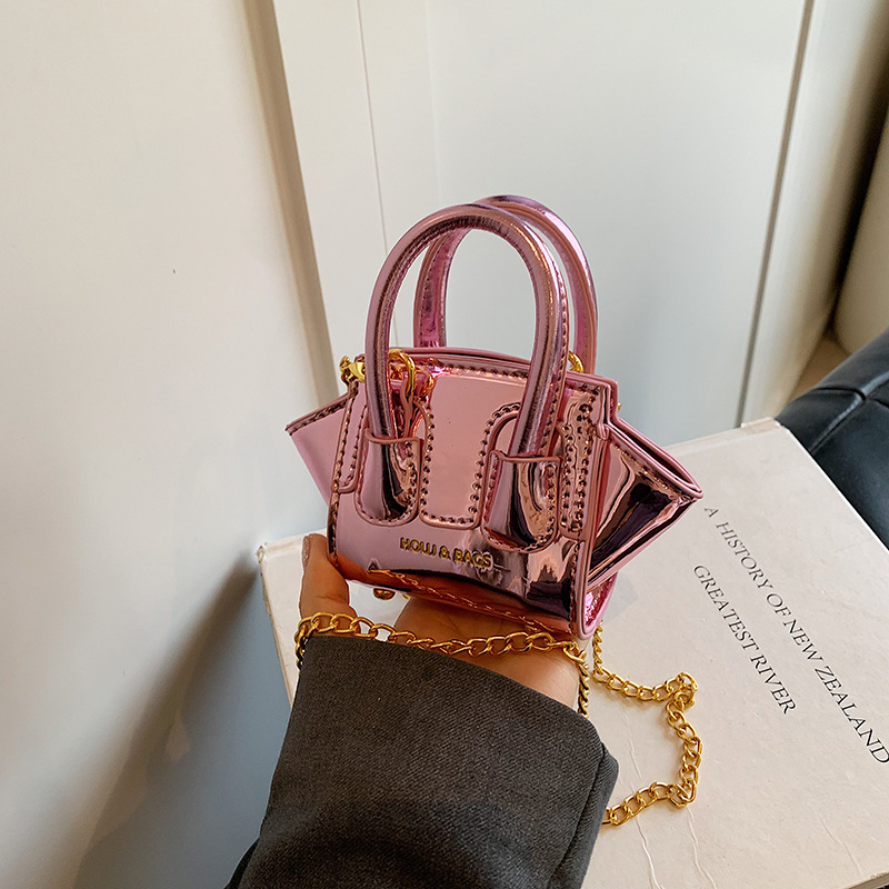 Trendy mini-oortelefoontas Cro - Interior Design Gold recensie en prijs
