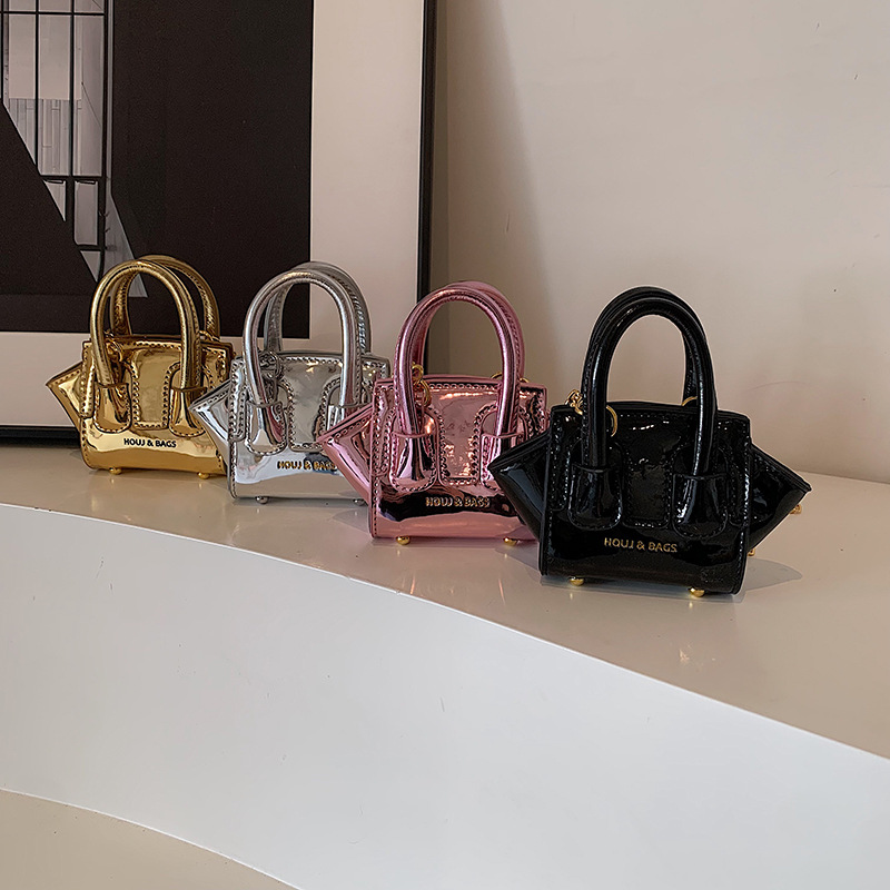 Trendy mini-oortelefoontas Cro - Interior Design Gold recensie en prijs